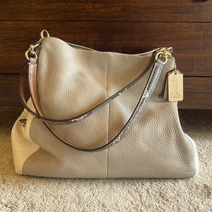 Coach updated hobo style. Two-tone, 3 section. L-13” H-11” W-7” (expands).